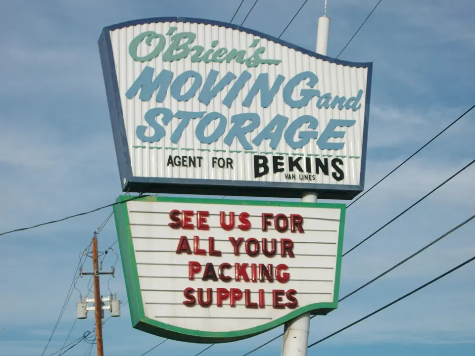 The vintage O'Brien's Moving and Storage, Agent for Bekins pole sign: See us for all your packing supplies