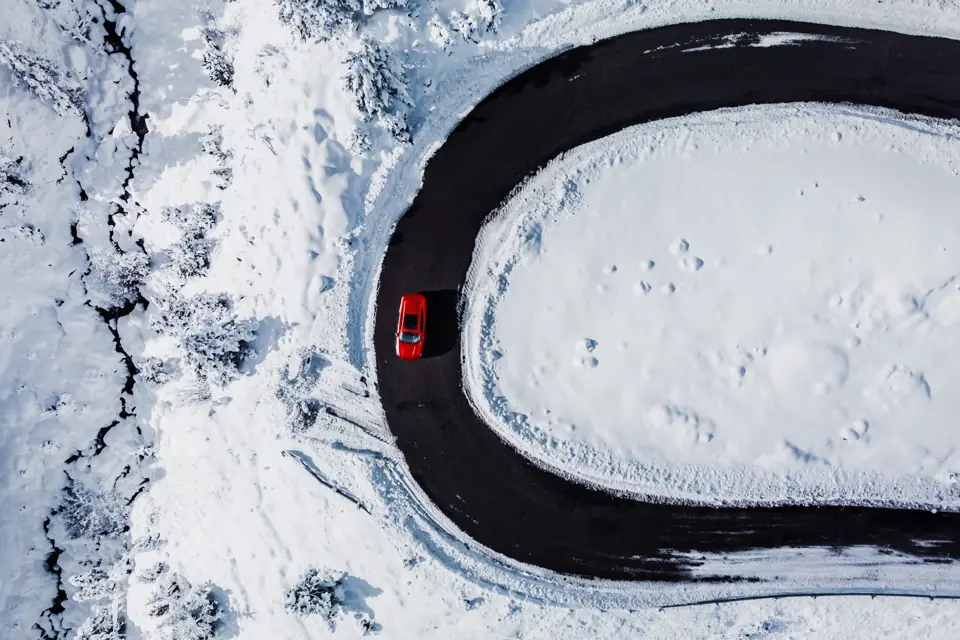 Winter mountain road, snow, chains