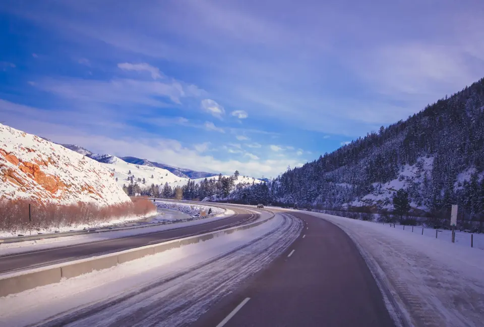 Winter mountain road, snow, chains