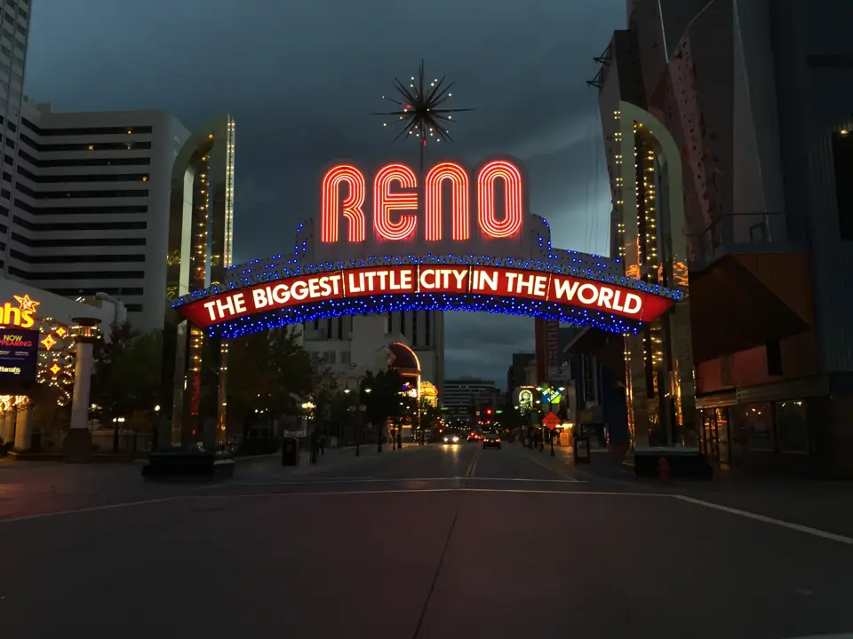 Reno Arch at night, lit