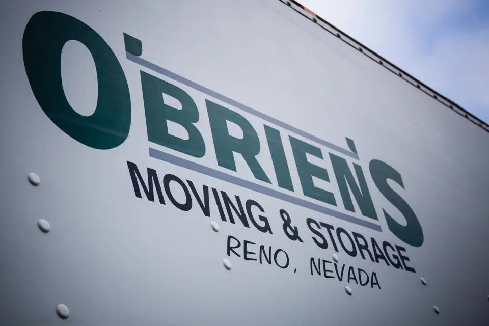 Close-up of O'Brien's Moving & Storage, Reno, Nevada lettering on a truck